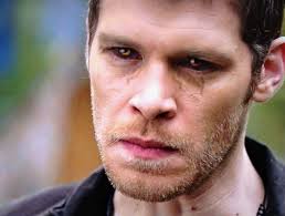 I know Klaus is a hybrid. He always says he is vampire (first) and wolf.  But is also a witch…he is also Esther's son. And did the ever say how  Michael became