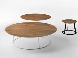 Round coffee tables offer an attractive contrast to the straight lines of most furniture. Casamania Horm Albino Family Round Wooden Coffee Table For Living Room