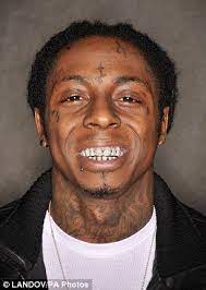 Lil wayne knew the impact of those diamonds in his teeth. As Madonna Brandishes Her Grillz Why Do The A List Insist On Sinking Their Teeth Into The Bizarre Mouth Bling Lil Wayne Rapper Lil Wayne Lil Wayne News