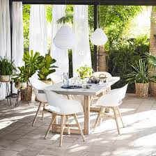 A Crisp White Moulded Plastic Seat And Acacia Legs Make The Ronan Chair A Delightfully Contemporary And Easy Care Addition To Any Under Cove Outdoor In 2019