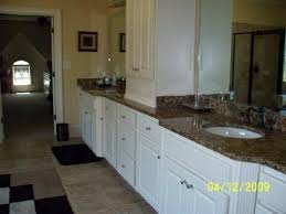 After removing the hardware, we recommend that the cabinets be thoroughly cleaned with a good cleaner degreaser to remove all grease and oils that normally buildup on kitchen cabinetry over time. White Cabinets Painted To Look Like Wood Hometalk