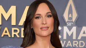 Kacey Musgraves dazzles in feathery denim frock at starry CMA Awards 2024  in Nashville