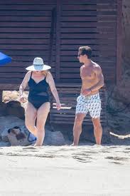 Rebel wilson may have been enjoying a holiday in tropical paradise hawaii on tuesday, but she fun in the sun: Rebel Wilson In Black Swimsuit With Boyfriend Jacob Busch In Cabo San Lucas Famousfix Com Post