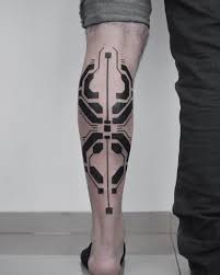 Futuristic Tattoos Of Georgie Williams Geometric Shape Tattoo Geometric Tattoo Pattern Cyberpunk Tattoo