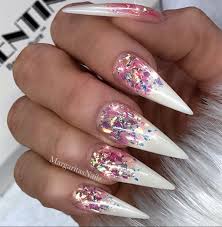 The stiletto nails come to a distinct point at the top and could poke an eye out if they needed to. Glitter Ombre Stiletto Nails Nail Art Gallery