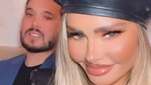 Chloe Sims flaunts her assets in a black body suit as she joins sisters  Demi and Frankie in London