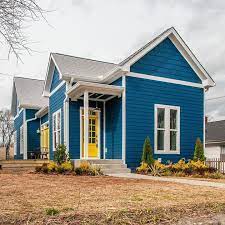 Blue house white trim yellow door. Blue House With Yellow Doors And White Trim House Exterior Blue Exterior House Colors Ranch House Exterior
