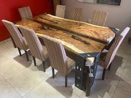 Bold and unique, the asymmetric pedestal base supports a distinctively detailed rectangular top, available in a. Wood Dining Tables Wood Coffee Tables Wood Mirrors Wood Lights