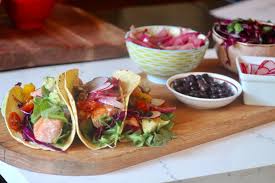 We don't have mexican heritage, but here we've studied and used flavors that are part of the traditions of mexican cuisine. Fish Tacos With Homemade Pickled Onions And Red Cabbage Slaw