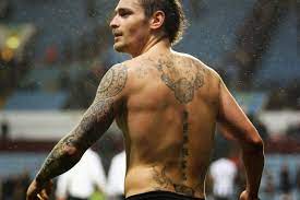 Celebrities, tattooed footballers, tattooed male celebrities, tattooed french celebrities, layvin kurzawa's tattoos, tattooed tattoo close up of arsenals olivier giroud. Tattoo Mayor