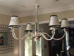 The imperfect nature of mercury glass coupled with the bronze frame makes this fixture a versatile piece perfect for rustic, modern, transitional, and eclectic spaces. Mercury Glass Chandelier Shade Ballard Designs In 2021 Mercury Glass Chandelier Glass Chandelier Shades Chandelier Shades