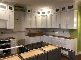 Frosted glass doors are easy to install in your kitchen cabinets. Glass Door On The Corner Cabinet