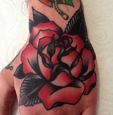 Red Black Flower Tattoo For Hand And Wrist Hand Tattoos Hand And Finger Tattoos Traditional Hand Tattoo