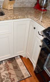 Folding Corner Cabinets Doors In The Closed Position They Open To Reveal A Lazy Susan Rotating Shelf Unit Kitchen Cabinets Kitchen Flooring Cabinet Design