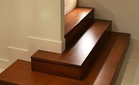 We can't trim the overhang back or fill in the back of the riser because the stair tread will be too shallow unless we take it down to 10 tread depth (which is allowable by wa state code though irc minimum is 11). No Overhang Nosing Gowling Stairs