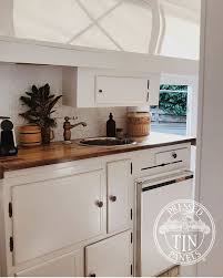 pressed metal kitchenette splash back white caravan caravan renovation caravan interior caravan decor
