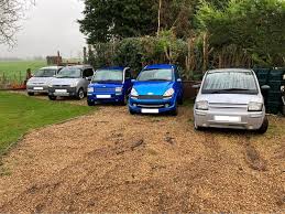 Image result for Orange 2011 Aixam-Mega