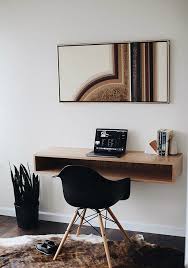 Some are designed to go in unused corners, others fold up and out of the way when you're not working, and all of them give you the workspace you need. 12 Floating Desks That Look Great And Take Up Minimal Space Living In A Shoebox Desk In Living Room Floating Desk Small Room Design