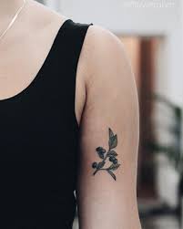 Tiny Blueberry Tattoo On The Left Upper Arm By Olga Nekrasova Tattoos Flower Tattoo Shoulder Pretty Flower Tattoos