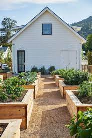 Lovely Raised Vegetables Garden Ideas Beside Farmhouse Building A Raised Garden Backyard Garden Layout Vegetable Garden Design