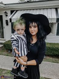 Beetlejuice costume for women is a dress with the iconic black and white stripes. Beetlejuice Baby Costume Off 79 Www Usushimd Com