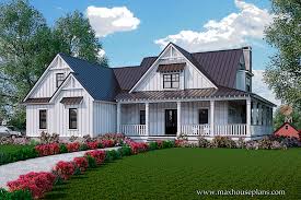 On the exterior, these house plans feature gable roof, dormers, steep roof pitches, and metal roofs. Carolina Farmhouse Modern Farmhouse House Plan