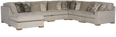 Button tufting and track arms lend this piece modern accents. King Hickory