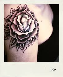 Gothic rose tattoos immensely inked with drops of blood. Rose Tattoo On Shoulder