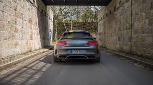 Manhart Works A Sweat On The Amg C63 S Squeezes 700 Hp Out Of It Amg C63 Amg Coilovers