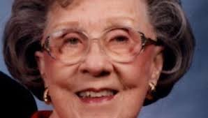 A poignant moment as the black hearse took pause along Ramsey Street