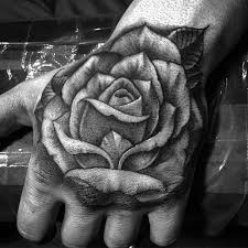 Chrissy lee tattooing a realistic rose on a hand in timelapse from start to finish Freehand Rose Hand Tattoo By Sir Twice Tattoonow
