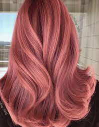 If you're not afraid of a bold pop of color, this red rose gold shade is sure to turn heads. 30 Best Rose Gold Hair Ideas Hair Color Pink Hair Styles Hair Color Rose Gold