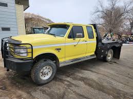 Image result for Bright Yellow 1990 Truck