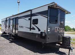 The bedroom offers plenty of storage, and you can even add an optional washer/dryer for even more convenience. Puma Destination Trailers By Palomino