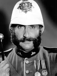 Nigel Green as Colour Sergeant Frank Bourne