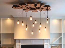 First & foremost, hammerworks colonial light fixtures include rustic outdoor copper lighting. Handmade Extra Large Live Edge Olive Wood Chandelier Rustic And Industrial Light Fixture By 7m Woodworking Custommade Com