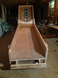 It's good for young and older kids alike, requires little setup, and even fewer quarters. Homemade Skeeball 10 31 14 Homemade Outdoor Games Backyard Games Backyard Fun