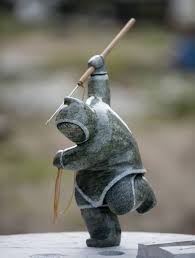 Images Capture Inuit Stone Carver Archie Ishulutak At Work Inuit Art Inuit Alaska Art