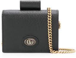 What is the best wallet to hold 10 i keep my wallet with other cards that i might need in my car; Gucci Chain Hardcase Wallet Shopstyle