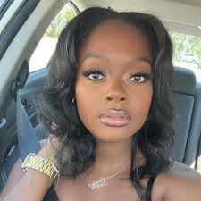 Who can do a shampoo and silk press in Charleston?