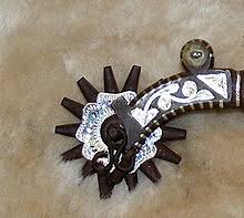 A short spike or spiked wheel that attaches to the american heritage® dictionary of the english language, fifth edition. Spur Wikipedia