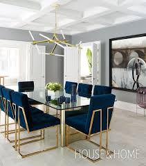 Featuring a curved high back, plush cushioned seat and deeply tufted velvet upholstery studded with dress up your dining room for an upcoming dinner party or round out a breakfast nook ensemble with this stylish side chair. A Modern Glass Table And Chandelier With Fluorescent Tubes Bring The Room Into The 21st Century While Plush Dining Room Design Luxury Dining Room Luxury Dining