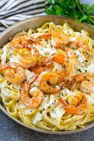 A Pan Of Shrimp Alfredo With Fettuccine Creamy Parmesan Sauce And Garlic Butter Shrimp Shrimp Alfredo Pasta Shrimp Dishes Shrimp Fettuccine