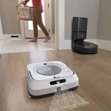 The fibers had gotten wound around the wheel and brush on the neato botvac d7 connected: Roomba I7 Self Emptying Robot Vacuum Cleaner With Clean Base Irobot