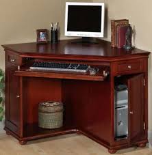 A great corner desk (with a sliding tray) of laminated wooden materials. Black Corner Computer Desk With Hutch Novocom Top
