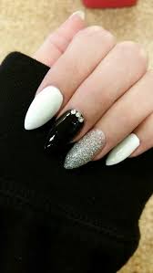 Black And White Almond Shaped Nails Stilleto Almond Nails White Black Glitter And Rhinestones Black Nail Designs Nails Design With Rhinestones Silver Nails