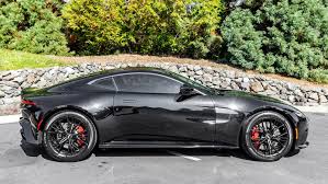 Image result for Marron Black 2021 Aston Martin