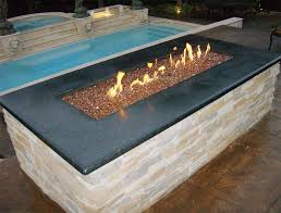 Lava rocks are dry, porous, and contains an undisclosed element that absorbs heat. How To Start A Fire With Glass On Fire Pit Glass Http Www Thewpjunkie Com How To Start A Fire With Glass On Glass Fire Pit Fire Pit Glass Rocks Fire Glass
