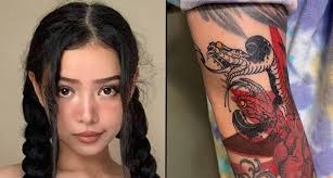 See more ideas about shark tattoos, tattoos, shark. Bella Poarch Has Offensive Tattoo Covered Up Following Backlash Popbuzz