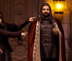 Nandor the relentless (played by kayvan novak) had been a ferocious soldier in the ottoman empire, while nadja (natasia demetriou) long ago setting the pilot and season in motion is nandor's reading of a letter they received from baron afanas (star trek: What We Do In The Shadows Nandor Long Coat